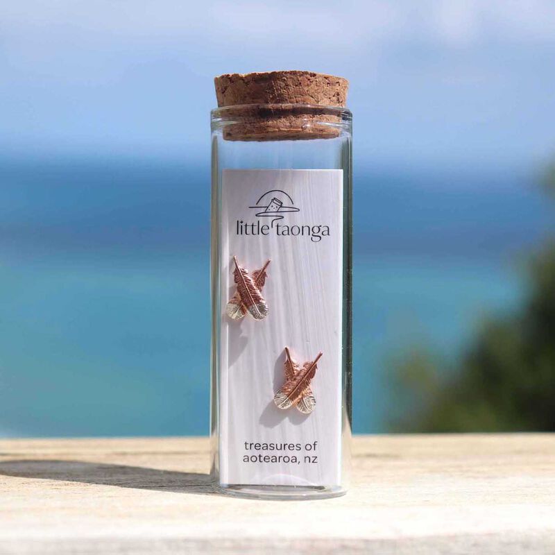 Little Taonga Huia Crossed Feather Earrings Rose Gold With Silver Tips image number 1